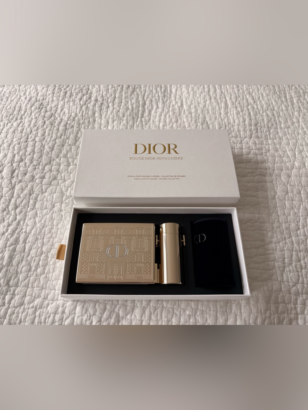 Dior Gold Rouge Dior minaudière clutch with a removable lipstick holder